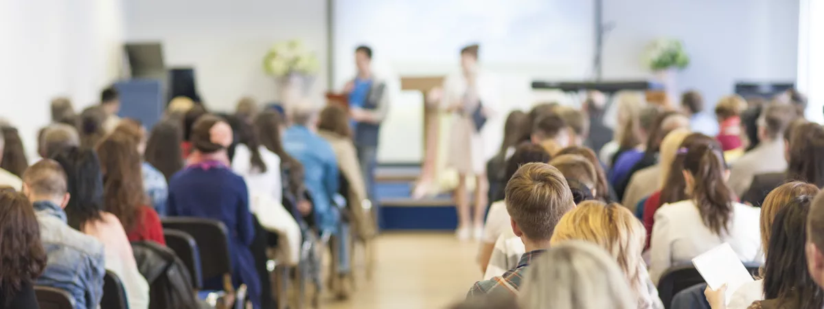 Community forum discussing reading policy