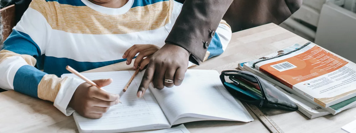 Tutor helping a student study
