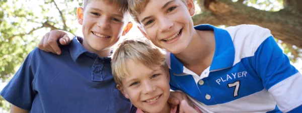Three smiling brothers